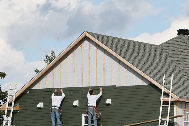 Professional Siding technician working in New Cumberland, WV